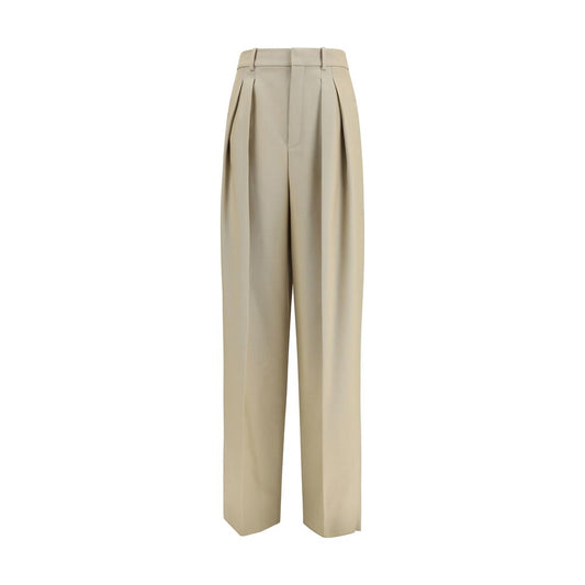 Trousers by Saint Laurent for women in canvas silk & wool beige presents a perennial silhouette, meticulously tailored with a regular-fit & wide cut, long finish, and an elegant high rise.