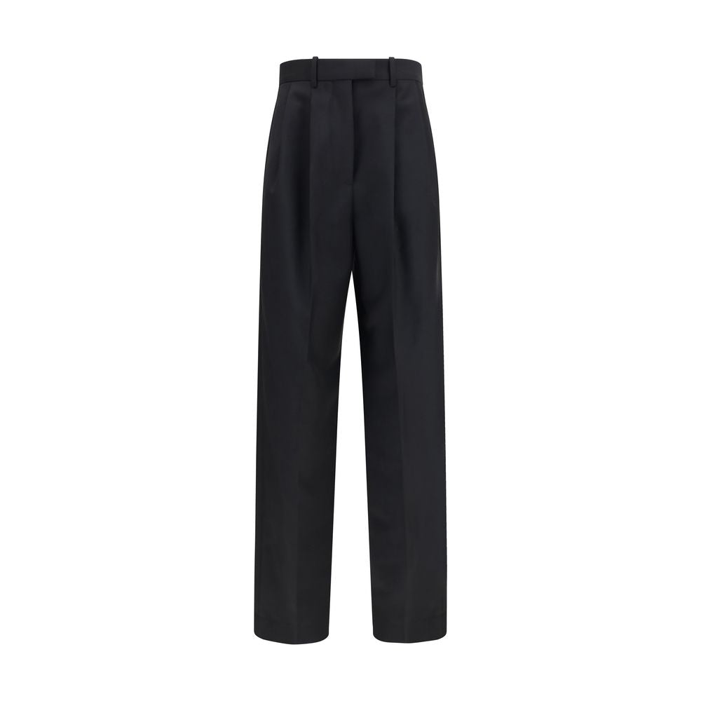 Trousers by Givenchy for women in mohair wool black features a tailored silhouette with a tailored regular-fit, defined by its long and a sophisticated .