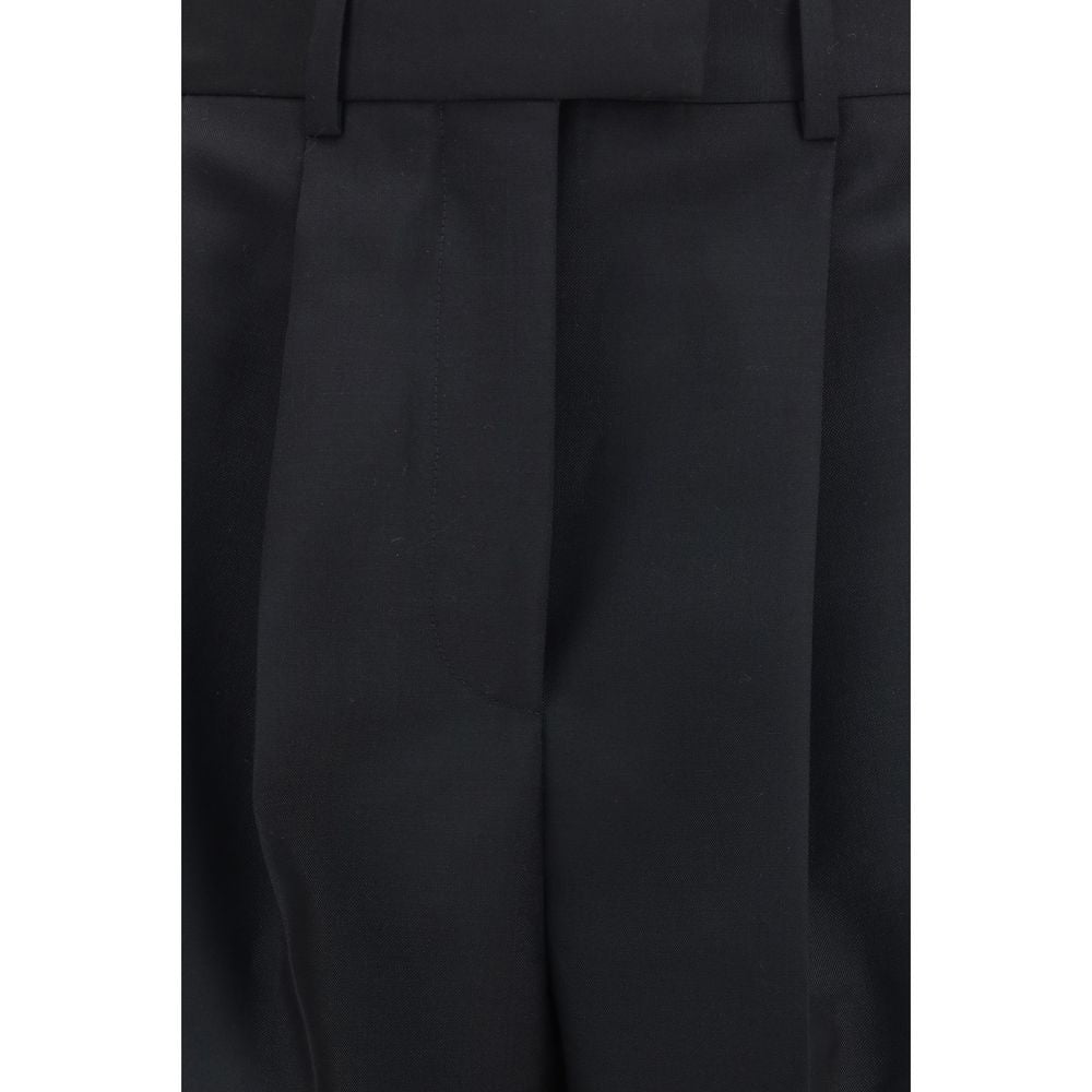 Trousers by Givenchy for women in mohair wool black features an sartorial silhouette, showcasing a precise regular-fit and long with a sartorial for a refined look.