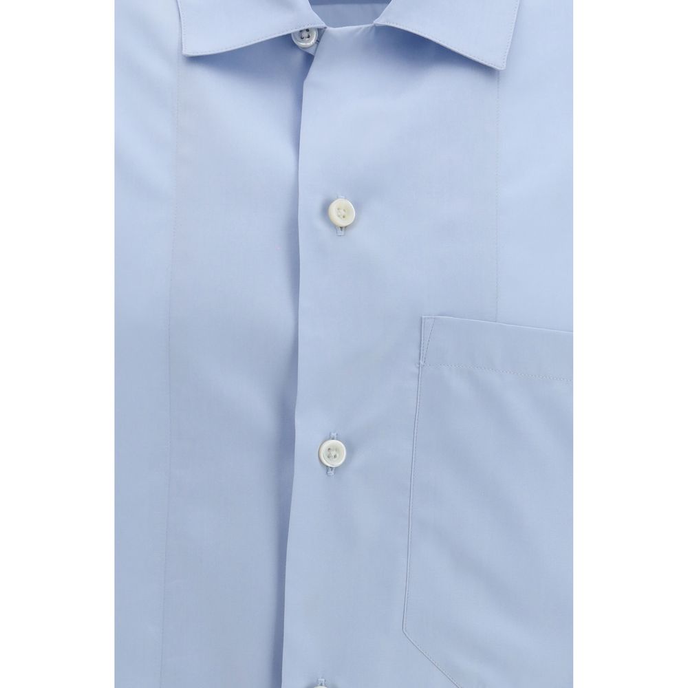 Shirt by Umit Benan for men in silk blue & havana presents a discerning silhouette, showcasing a sophisticated and for a truly discerning finish.