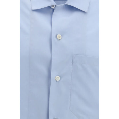 Shirt by Umit Benan for men in silk blue & havana presents a discerning silhouette, showcasing a sophisticated and for a truly discerning finish.