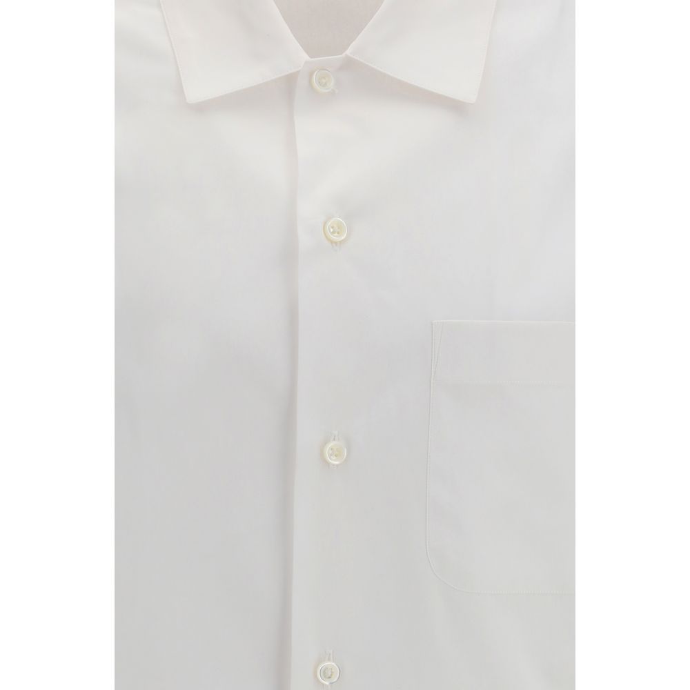Dress Shirt by Umit Benan for men in cotton white showcases a sleek silhouette, elegantly detailed with a sleek and for a sleek finish.