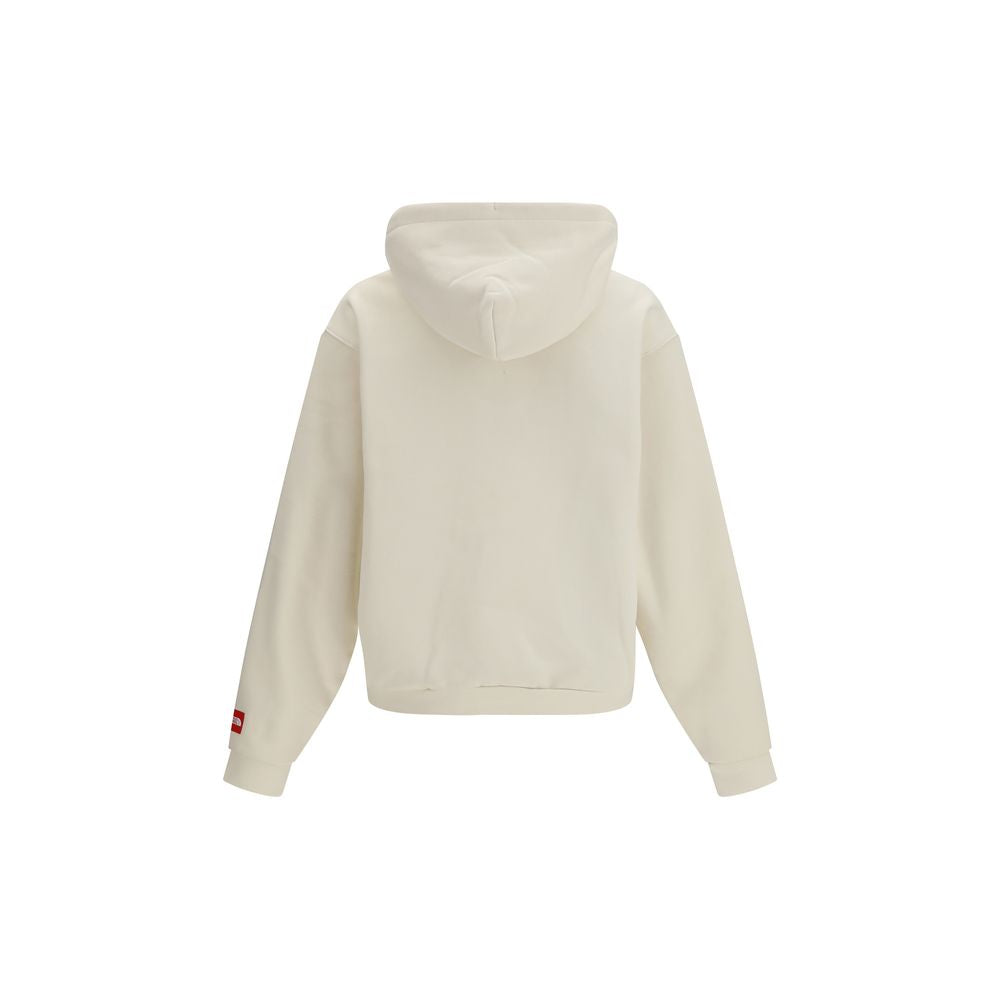 Sweatshirt Hoodie by The North Face for men in cotton polyester red & white features a slouchy chic silhouette, detailed with a slouchy chic and a signature hooded crew neckline for an elevated aesthetic.