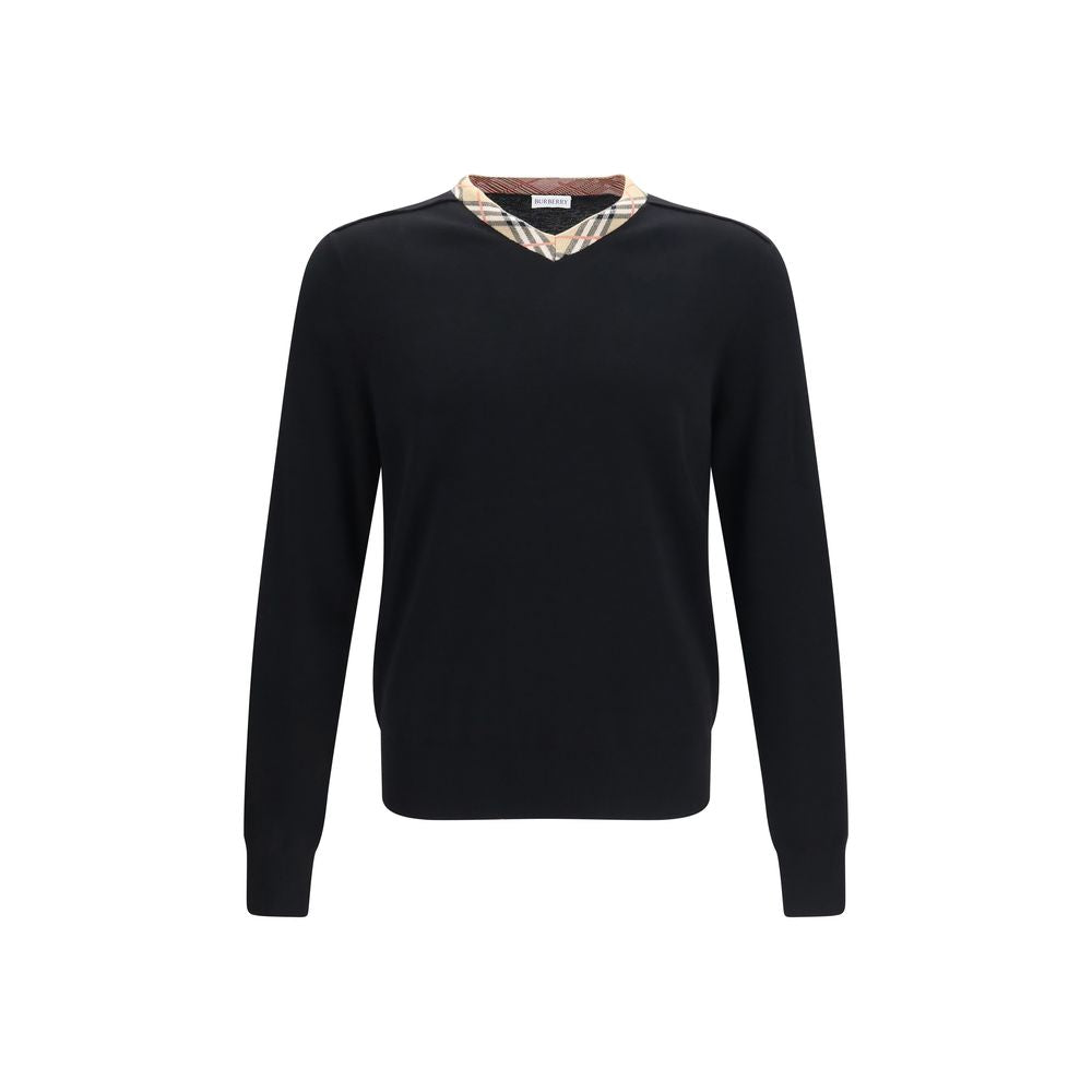 Sweatshirt by Burberry for men in merino wool black, sand & signature features an provocated silhouette, detailed with a provocated long-sleeve and a refined v-neck neckline for a sophisticated aesthetic.