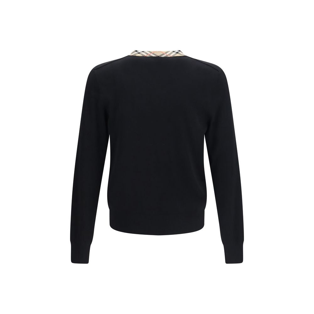 Sweatshirt by Burberry for men in merino wool black, sand & signature features an provocated silhouette, detailed with a provocated and a refined v-neck neckline for a sophisticated aesthetic.