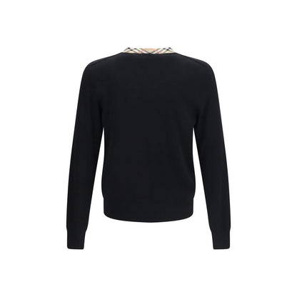 Sweatshirt by Burberry for men in merino wool black, sand & signature features an provocated silhouette, detailed with a provocated and a refined v-neck neckline for a sophisticated aesthetic.
