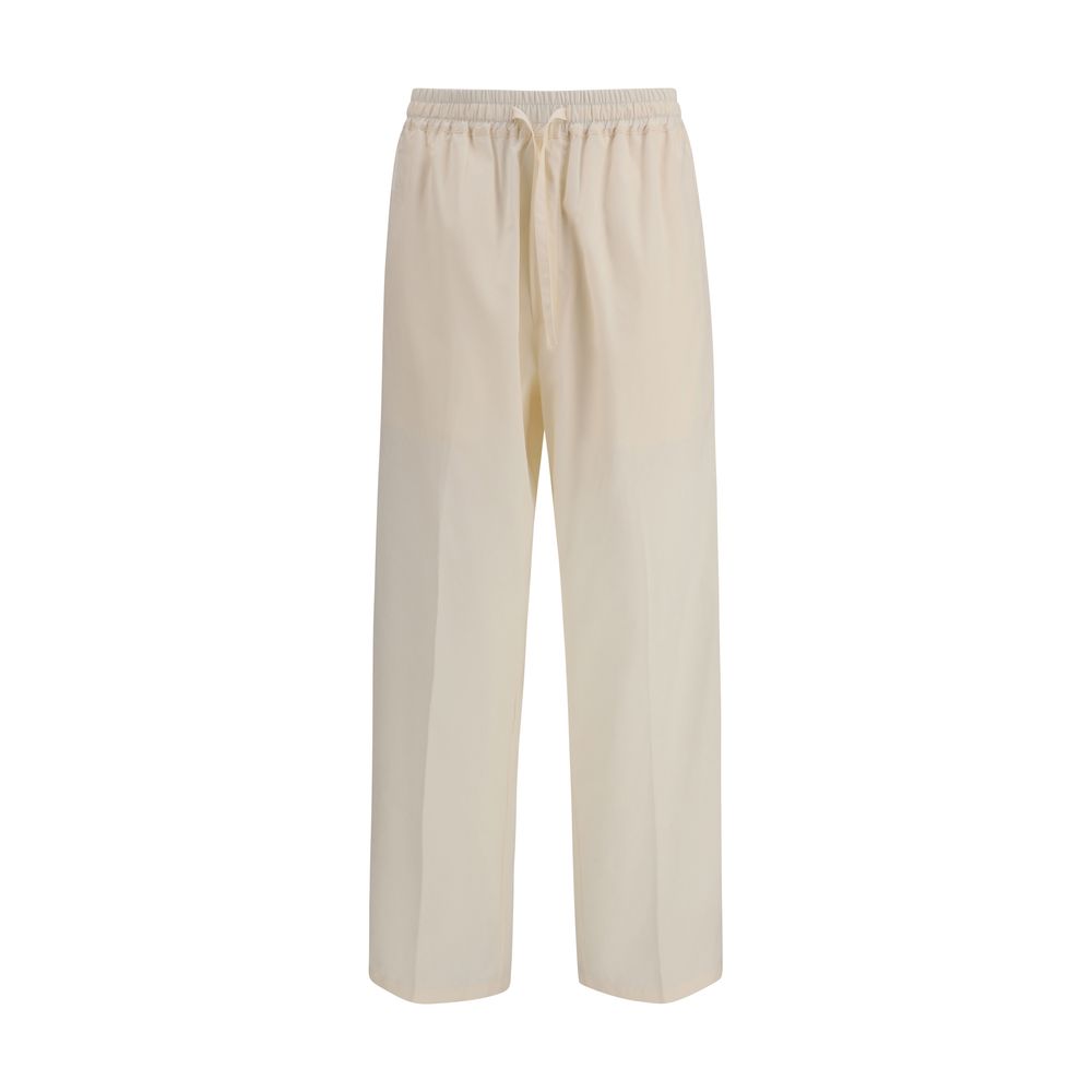 Casual Pants by Umit Benan for men in cotton & silk beige features an sartorial straight-leg & regular-fit and long with a cut for a sartorial finish.