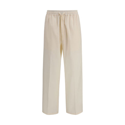 Casual Pants by Umit Benan for men in cotton & silk beige features an sartorial straight-leg & regular-fit and long with a cut for a sartorial finish.