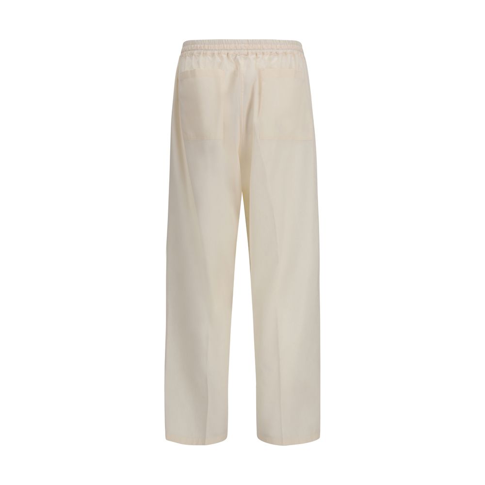Casual Pants by Umit Benan for men in cotton & silk beige presents a tailored silhouette, showcasing a tailored straight-leg & regular-fit and long cut with a refined for a truly tailored aesthetic.