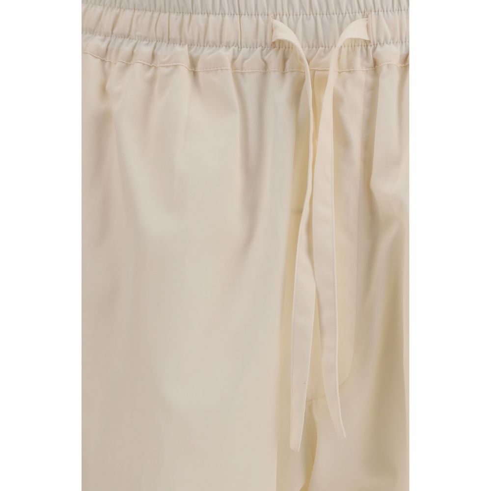 Casual Pants by Umit Benan for men in cotton & silk beige features an sophisticated and straight-leg & regular-fit with a precise long, creating a sophisticated and sophisticated silhouette.