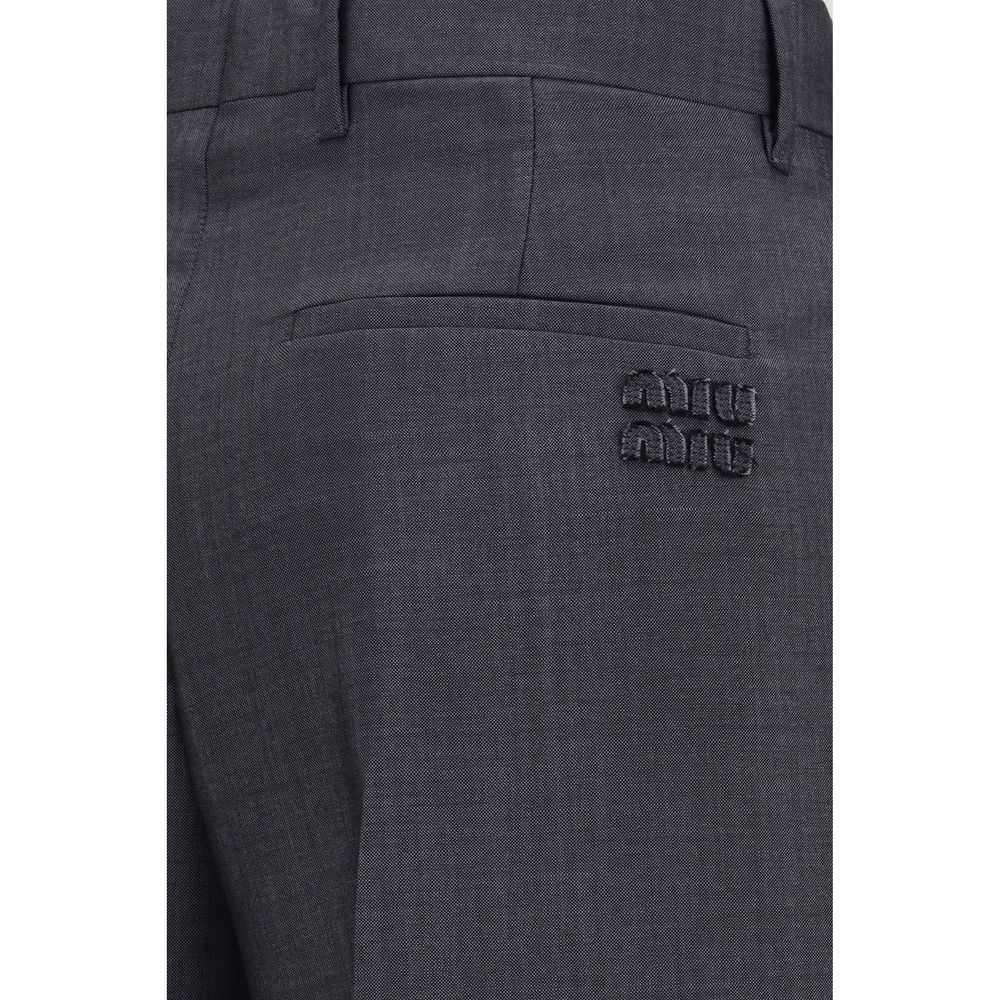 Trousers by Miu Miu for women in mohair wool gray features an sartorial silhouette, showcasing a precise straight & regular-fit and long with a sartorial for a refined look.