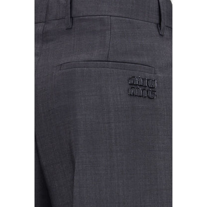 Trousers by Miu Miu for women in mohair wool gray features an sartorial silhouette, showcasing a precise straight & regular-fit and long with a sartorial for a refined look.