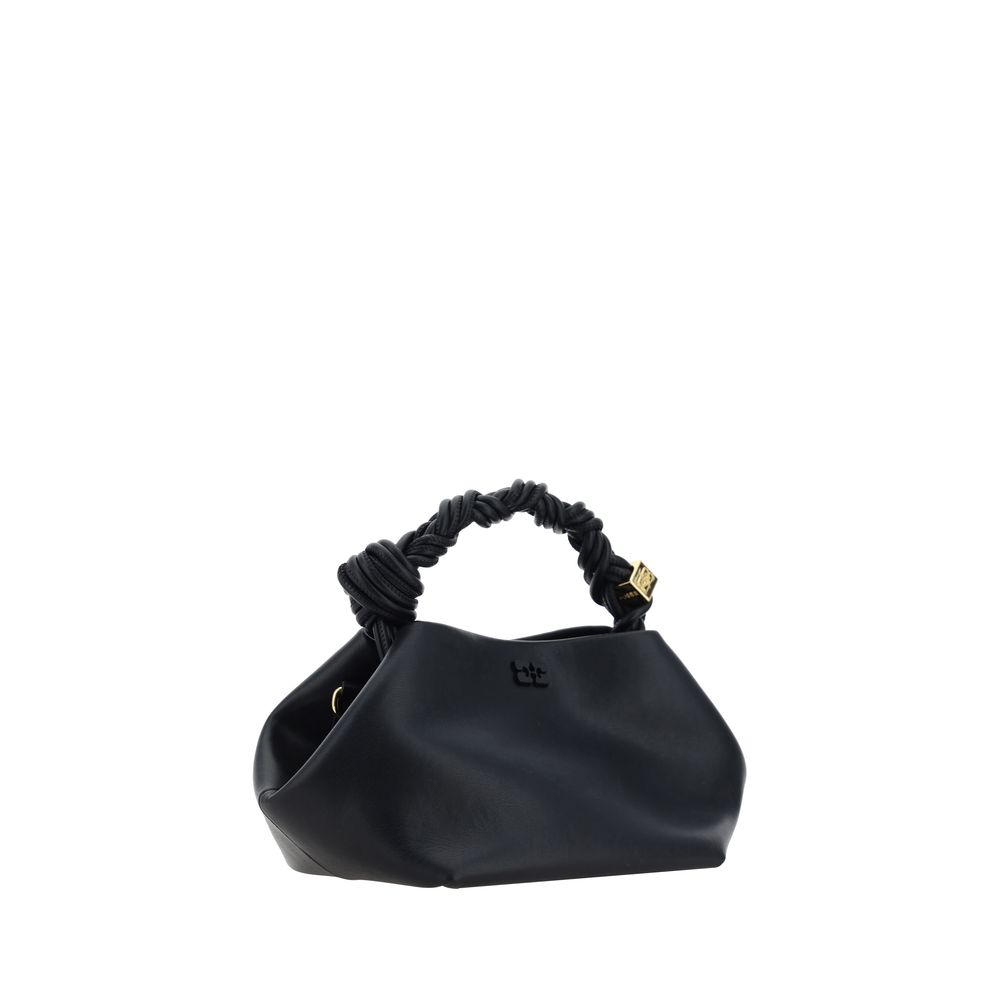 Handbag by Ganni for women in polyester polyurethane leather black features a contemporary silhouette, showcasing a secure magnetic, ample , and contemporary shoulder-strap, handle & adjustable-strap for a sophisticated look.