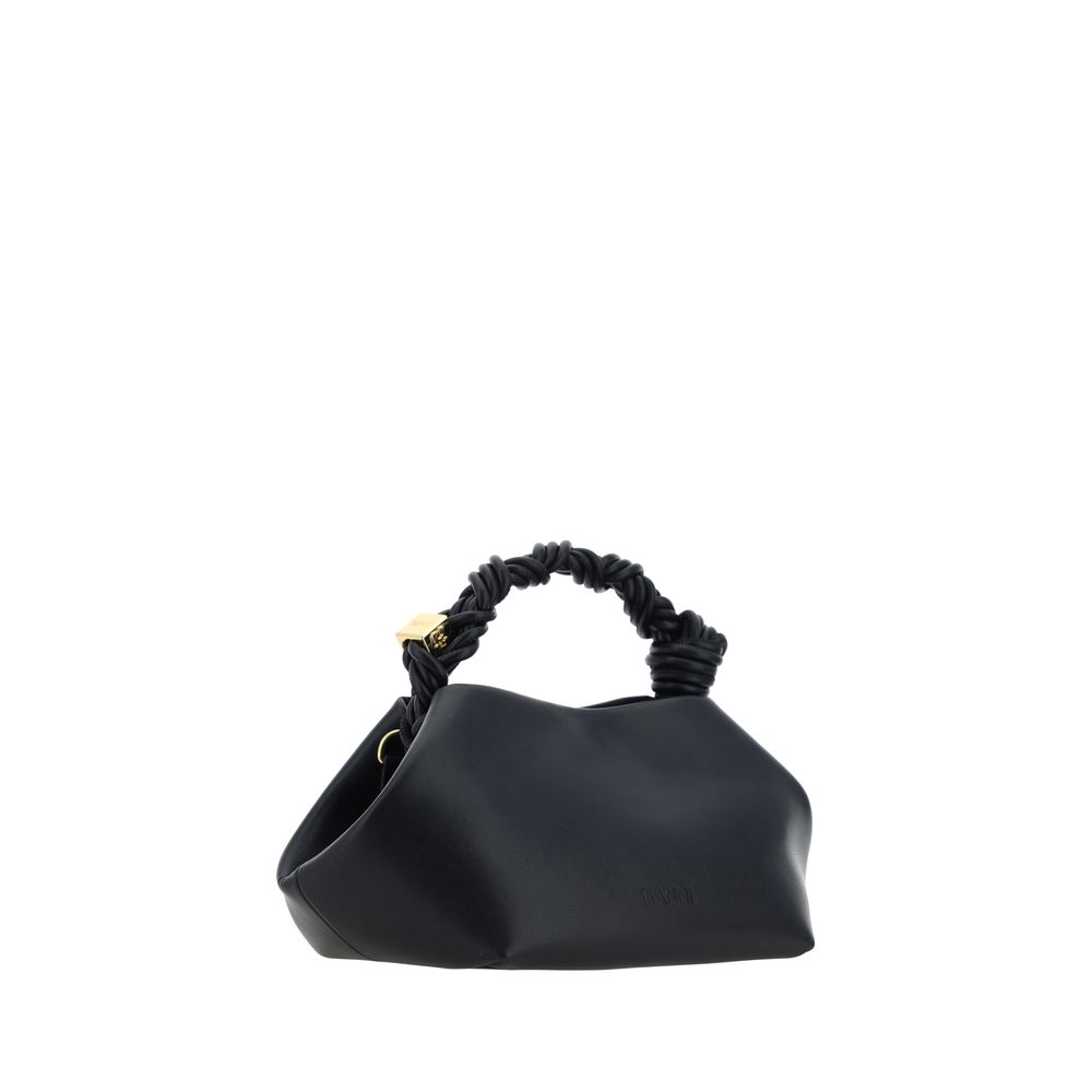 Handbag by Ganni for women in polyester polyurethane leather black presents a ornamental silhouette, showcasing a secure magnetic, ample , and versatile shoulder-strap, handle & adjustable-strap for a ornamental finish.