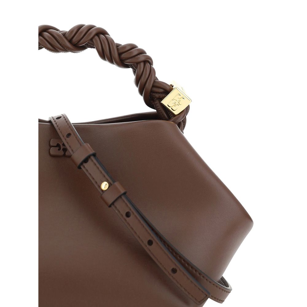 This Mini Handbag by Ganni for women in nylon polyester polyurethane & calf leather and brown presents a sculptural silhouette featuring a secure magnetic, ample built-in-compartments, and versatile shoulder-strap, handle & adjustable-strap for a sculptural finish.