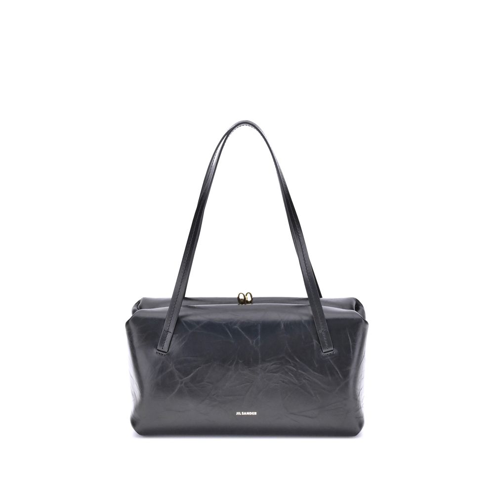 Small Shoulder Clutch Bag by Jil Sander for women in bos taurus calf leather black presents a versatile silhouette, showcasing a secure snap and versatile cardholder with versatile shoulder-strap & handle for a sophisticated look.