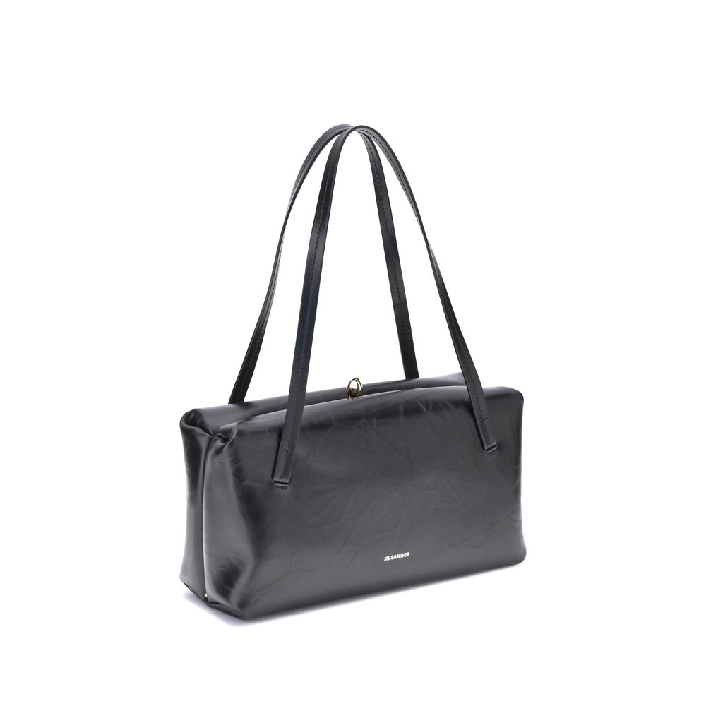 Small Shoulder Clutch Bag by Jil Sander for women in bos taurus calf leather black features a enviable silhouette, showcasing a secure snap, ample cardholder, and enviable shoulder-strap & handle for a enviable finish.