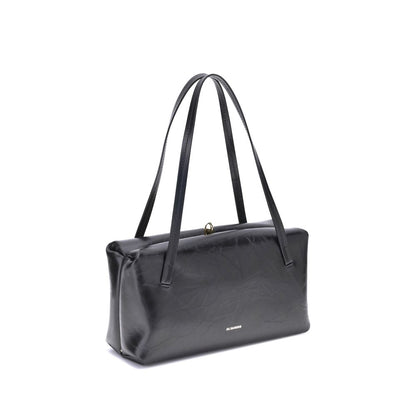 Small Shoulder Clutch Bag by Jil Sander for women in bos taurus calf leather black features a enviable silhouette, showcasing a secure snap, ample cardholder, and enviable shoulder-strap & handle for a enviable finish.