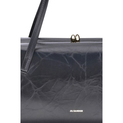Small Shoulder Clutch Bag by Jil Sander for women in bos taurus calf leather black presents a versatile silhouette, showcasing a secure snap and versatile cardholder with versatile shoulder-strap & handle for a sophisticated look.
