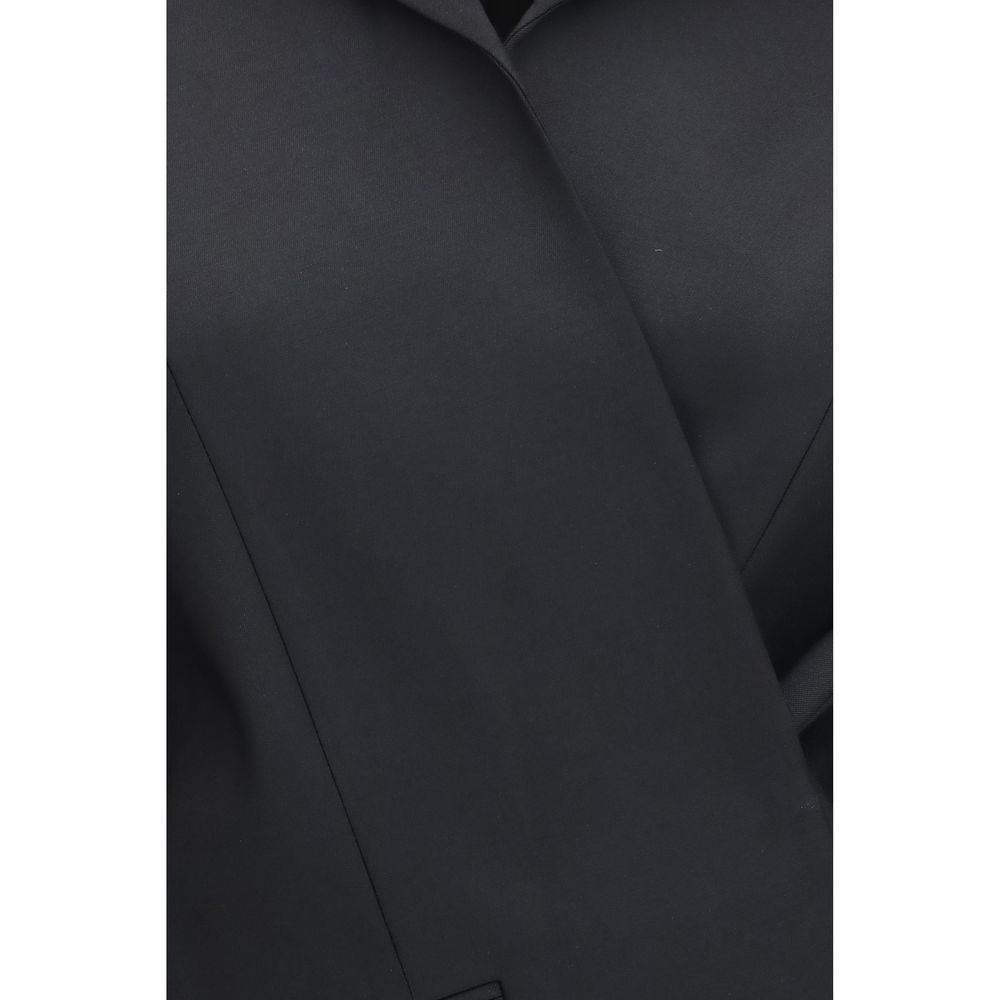 Overcoat by Khaite for women in silk cupro wool twill black presents a luxurious silhouette, showcasing a luxurious and sophisticated for a premium, luxurious look.