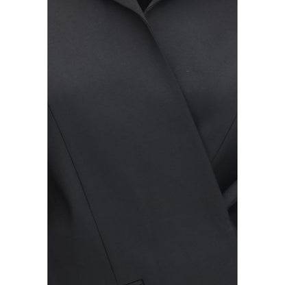 Overcoat by Khaite for women in silk cupro wool twill black presents a luxurious silhouette, showcasing a luxurious and sophisticated for a premium, luxurious look.