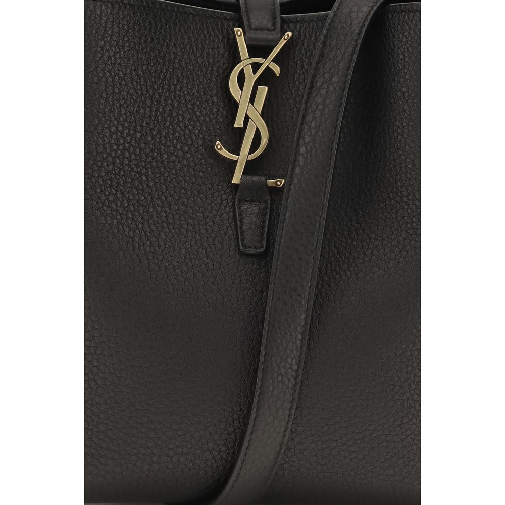 Mini Shoulder Bucket Bag by Saint Laurent for women in bos taurus calf grained & suede leather black & signature presents a versatile silhouette, showcasing a secure hook and versatile with versatile shoulder-strap, handle & adjustable-strap for a sophisticated look.