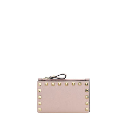 Cardholder Wallet by Valentino Garavani for women in bos taurus calf leather pink showcases a distinguished silhouette, artfully capturing the essence of the distinguished Rockstud Bos Taurus Calf Leather Cardholder Wallet design with functional card-organization compact-design coin-purse.