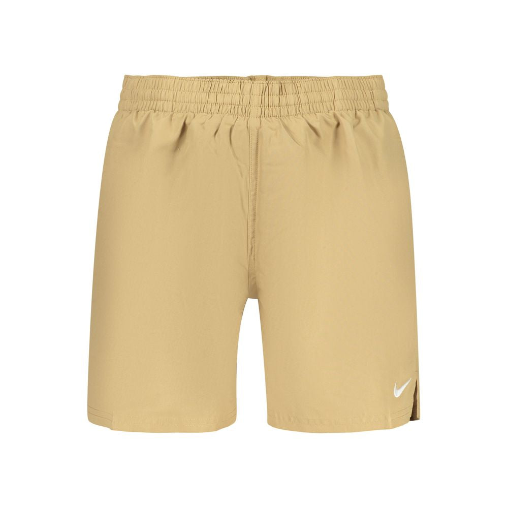 Swim Shorts by Nike for men in polyester and beige showcases a sinuous silhouette, expertly cut for a sinuous fit as part of the Men's Polyester Swim Shorts collection.