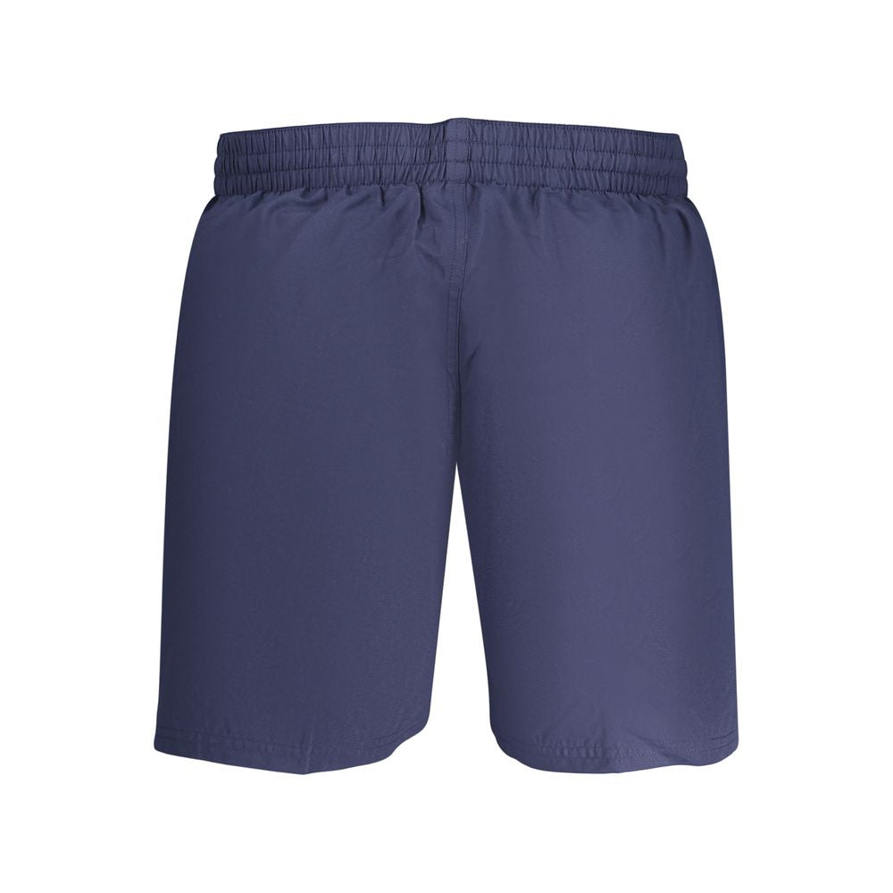 Swim Shorts by Nike for men in polyester and blue showcases a sinuous silhouette, expertly cut for a sinuous fit as part of the Waves Men's Polyester Swim Shorts collection.