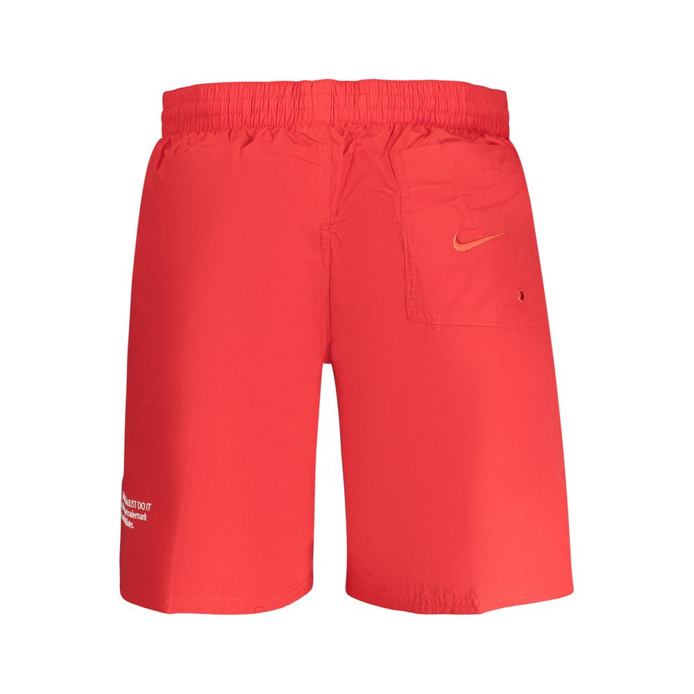 Swim Shorts by Nike for men in polyester red features an dramatic silhouette that defines the luxurious aesthetic and refined cut of the Men's Polyester Swim Shorts.