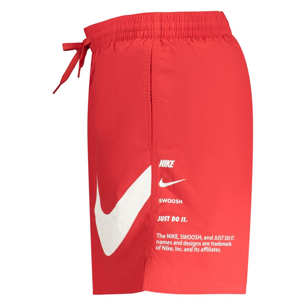 Swim Shorts by Nike for men in polyester red showcases a sculptural silhouette, expertly capturing the sophisticated essence of the sculptural Men's Polyester Swim Shorts design for a premium poolside look.