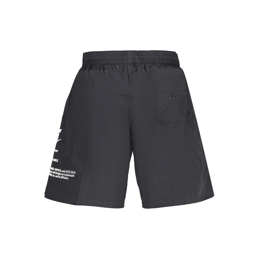 Swimwear by Nike for men in polyester black & print features a beatiful silhouette, artfully capturing the beatiful Waves Men's Polyester Swimwear design for a sophisticated and beatiful summer look.