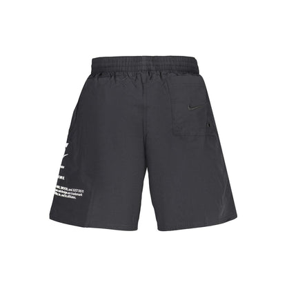 Swimwear by Nike for men in polyester black & print features a beatiful silhouette, artfully capturing the beatiful Waves Men's Polyester Swimwear design for a sophisticated and beatiful summer look.