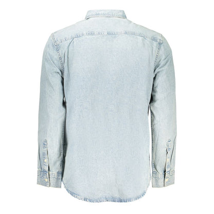 Shirt by Calvin Klein for men in denim blue features an architectural silhouette with a refined and elegant for a architectural look.