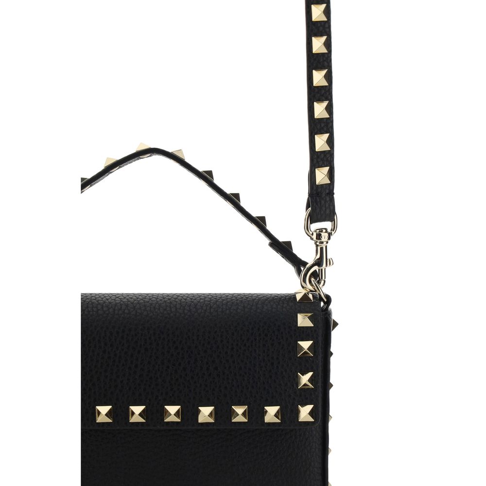 Mini Evening Shoulder Bag by Valentino Garavani for women in bos taurus calfskin leather black, signature & print features a distinguished silhouette, showcasing a secure and distinguished with versatile shoulder-strap for a distinguished finish.