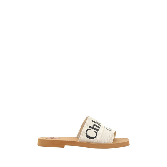 Flat Sandals by Chloé for women in polyester cotton & linen white & signature features an statuesque Woody Women's Polyester Cotton & Linen Flat Sandals silhouette with a refined flat and elegant square toe style.