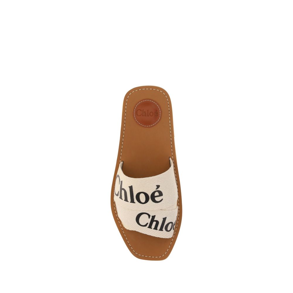 Flat Sandals by Chloé for women in polyester cotton & linen white & signature features an architectural design from the Woody Women's Polyester Cotton & Linen Flat Sandals collection, defined by a architectural flat and square toe style for a architectural finish.