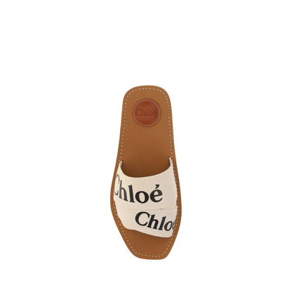 Flat Sandals by Chloé for women in polyester cotton & linen white & signature features an architectural design from the Woody Women's Polyester Cotton & Linen Flat Sandals collection, defined by a architectural flat and square toe style for a architectural finish.