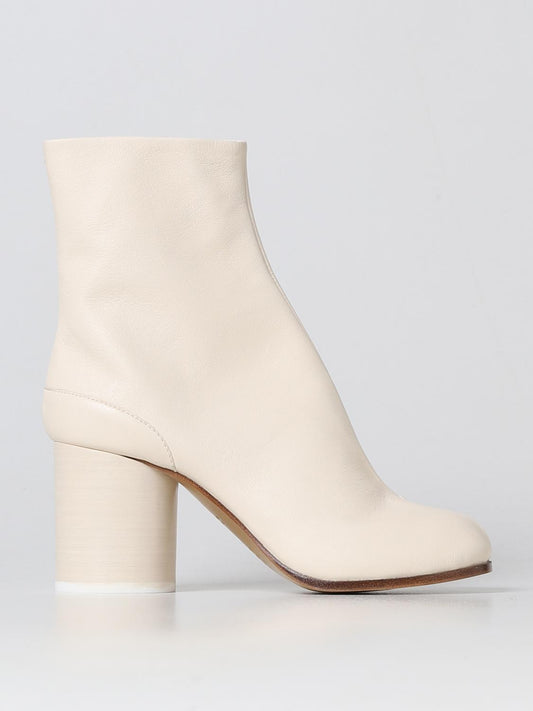 Ankle Boots by Maison Margiela for women in leather white features an avant-garde Women's Leather Ankle Boots silhouette, defined by a sophisticated and a avant-garde .