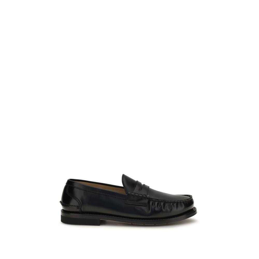 This Loafer Slip-On Shoes by Premiata for men in bos taurus calfskin leather black features an exquisite silhouette from the Men's Bos Taurus Calfskin Leather Loafer Slip-On Shoes collection, defined by a sophisticated and elegant .