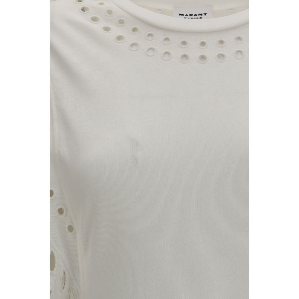 Dress by Isabel Marant Étoile for women in organic cotton white, patterned & toile showcases a striking silhouette, elegantly detailed with a , refined round neckline, and a striking short for a striking finish.