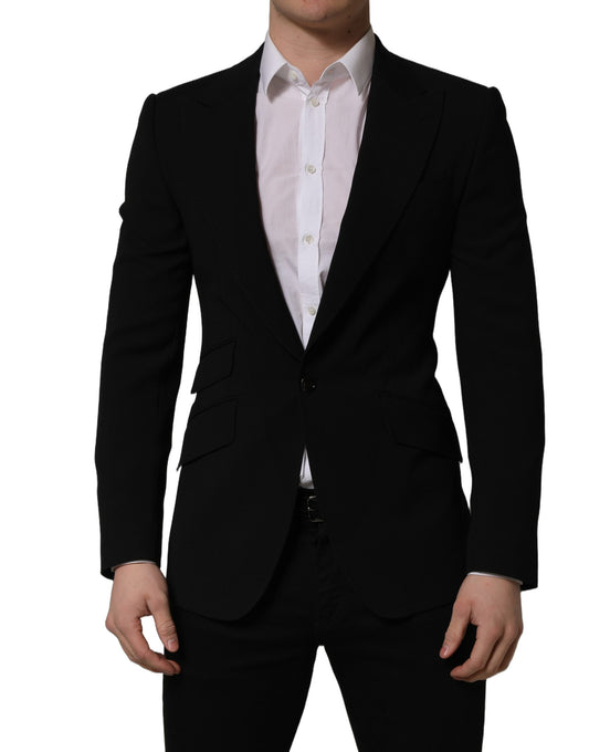 This Blazer by Dolce & Gabbana for men in virgin wool & silk black presents a tailored silhouette, meticulously tailored with a tailored wrap single-breasted neckline and distinctive for a tailored finish.