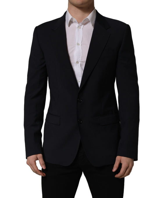 Blazer by Dolce & Gabbana for men in polyester & wool black presents a distinguished silhouette, detailed with a distinguished wrap single-breasted neckline and distinctive for a truly sophisticated finish.