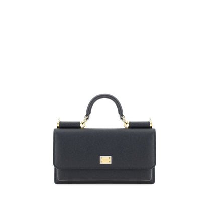 Micro Shoulder Flap Bag by Dolce & Gabbana for women in bos taurus calf leather black & signature showcases a enviable silhouette, artfully detailed with a secure flap, magnetic & button, organized , and versatile shoulder-strap & handle for a enviable look.