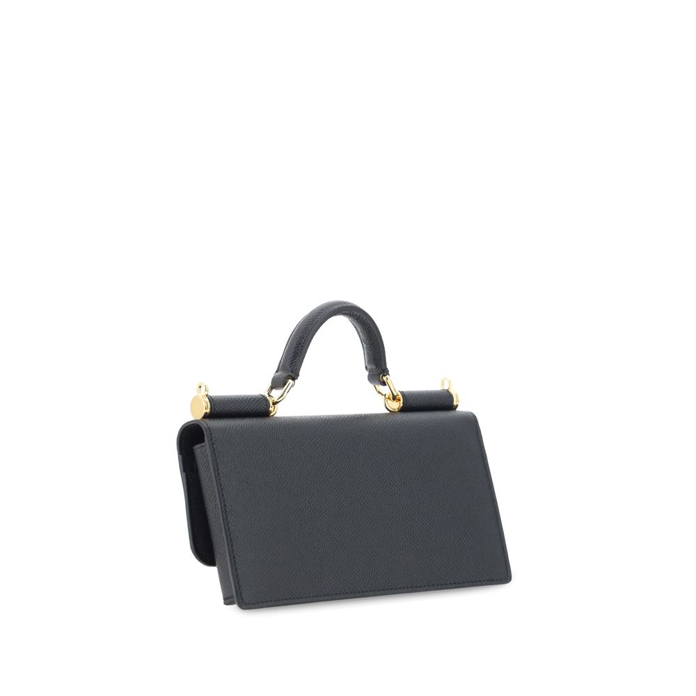 Micro Shoulder Flap Bag by Dolce & Gabbana for women in bos taurus calf leather black & signature features a effortless sophistication silhouette, secured by a flap, magnetic & button with ample and versatile shoulder-strap & handle for a effortless sophistication finish.