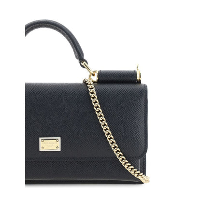 Micro Shoulder Flap Bag by Dolce & Gabbana for women in bos taurus calf leather black & signature features a distinguished silhouette, showcasing a secure flap, magnetic & button and distinguished with versatile shoulder-strap & handle for a distinguished finish.