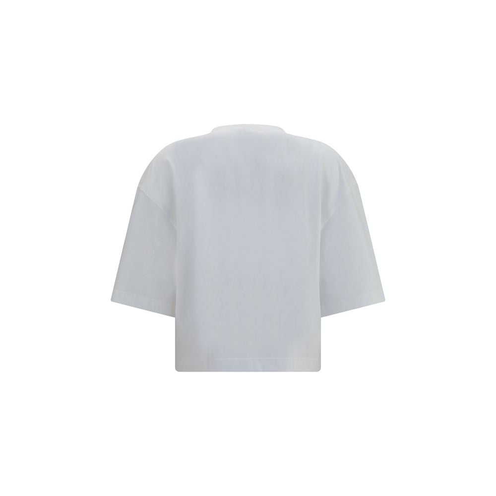T-Shirt by Brunello Cucinelli for women in cotton white showcases a fashionable silhouette, elegantly detailed with a fashionable and round neckline for a sophisticated, high-fashion look.