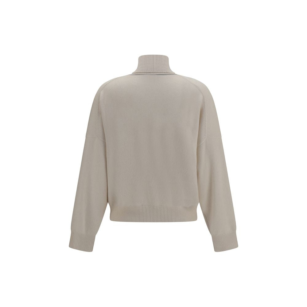 Sweater by Brunello Cucinelli for women in cashmere beige showcases a downtown chic silhouette, artfully finished with a downtown chic turtle neckline and for a sophisticated, high-end look.