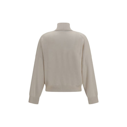 Sweater by Brunello Cucinelli for women in cashmere beige showcases a downtown chic silhouette, artfully finished with a downtown chic turtle neckline and for a sophisticated, high-end look.