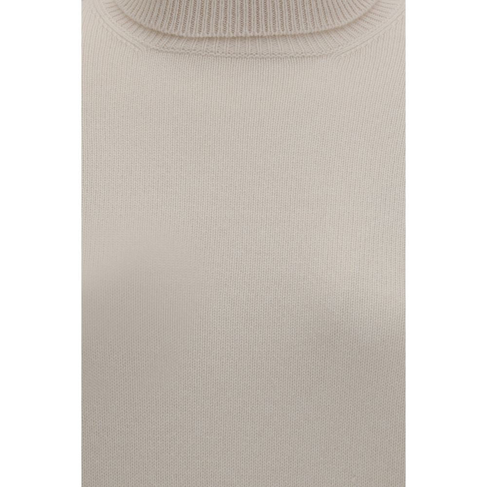 Sweater by Brunello Cucinelli for women in cashmere beige showcases a discreet silhouette, finished with a discreet and for a discreet look.